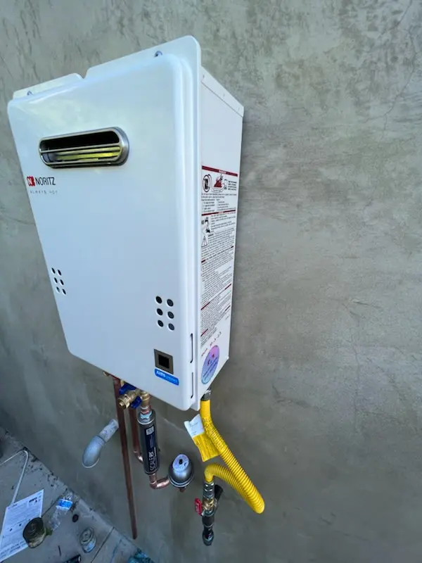 Tankless water heater installation for Old Quaker Meetinghouse homes
